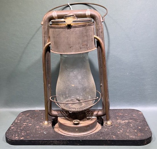 ANTIQUE DEITZ LANTERN ON FOOT WARMER: 14" X 16" X 7-1/2"