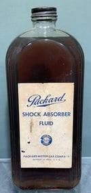 VINTAGE PACKARD SHOCK ABSORBER FLUID GLASS BOTTLE