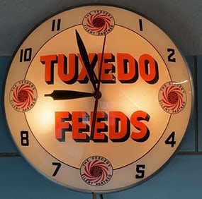 VINTAGE TUXEDO FEEDS LIGHTED ADVERTISING CLOCK
