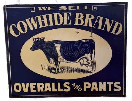 COWHIDE BRAND METAL FLANGE ADVERTISING SIGN: 12-1/2" X 10"