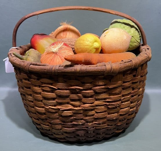 ANTIQUE BASKET W/ FAUX VEGETABLES: 14" X 11"