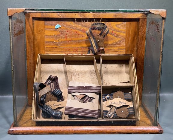 "THE SUN-GARTER'S" ADVERTISING DISPLAY CASE W/ CON: 15" X 7" X 12-1/2"