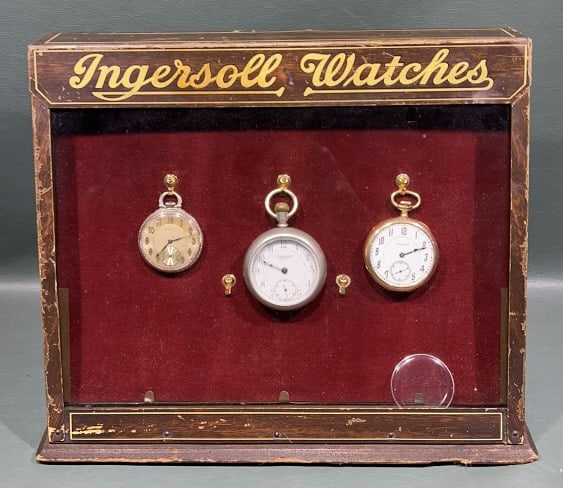 INGERSOLL WATCHES TIN & WOOD DISPLAY ADVERTING PIE: 10" X 12" X 5-1/2"