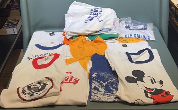21 VINTAGE T-SHIRTS: Various sizes. Some with stains. Duffy's shirt measures 24 1/4" length