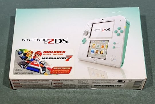 NINTENDO 2DS W/ BOX: Tested and working at time of cataloguing but does not have charger. Box measures 5 1/4" x 8 1/4"