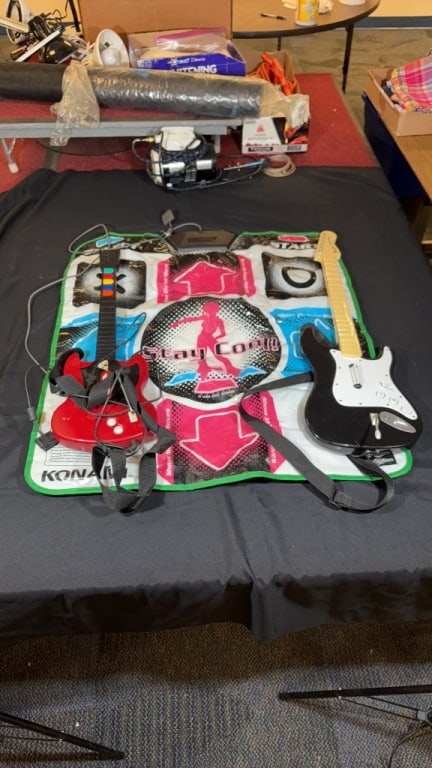 (3) Rock Band Guitars & Dance Dance Revolution Pad: Untested. Larger guitar measures 32 1/4" in length and is 10 1/4" in width.