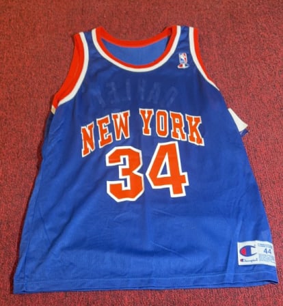 CHAMPION NEW YORK KNICKS CHARLES OAKLEY JERSEY: Size Large. New old stock. Retains original paper tags.