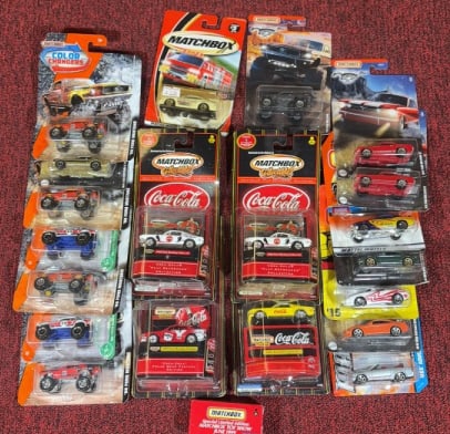 (21) MATCHBOX DIECAST FORD MUSTANG TOY CARS: All in packaging. Coca-Cola cards measure 4 1/4" x 8 3/8".