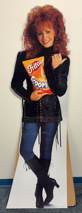 REBA MCENTIRE FRITOS SCOOPS CARDBOARD SIGN: Measures 20" in with and stands 68" in height.