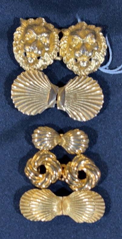 (5) DOTTY SMITH GOLD TONE COSTUME BELT BUCKLES: All are signed. Lion buckle measures 3 3/8" in length and 2" in height.