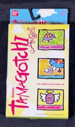 BANDAI TAMAGOTCHI ANGEL POCKET PET TOY IN BOX: Does not appears to have ever been used. Box measures 4 1/4" in width and is 8" in height.