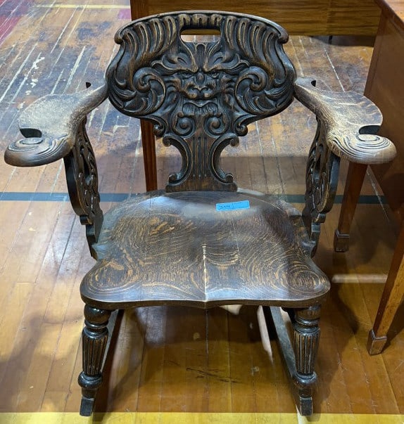 ANTIQUE OAK ROCKER WITH CARVED "NORTH WIND" FACE (1 of 6)