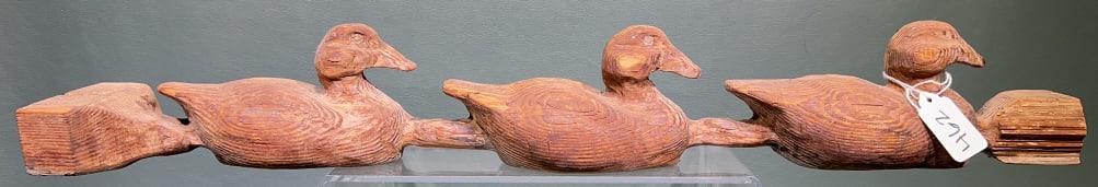 CARVED WOODEN DUCKS IN A ROW: 24"