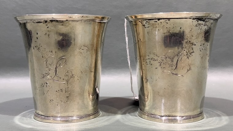 AMERICAN COLONIAL SILVER BEAKERS, B. HALSTEAD: Both Beakers Signed to Base Halsted (Halstead) and Dating from Late 18thC. Each Engraved with an "L". Descended in a Ct. Family. Each measures 3 3/8" tall and weigh approx. 111.5 grams ea.