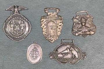 STERLING ADVERTISING & MILITARY FOBS: ~