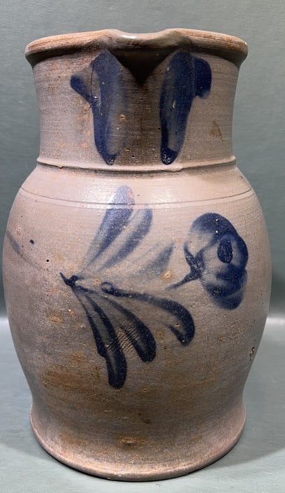 ANTIQUE BLUE DECORATED STONEWARE PITCHER: 10" X 7"