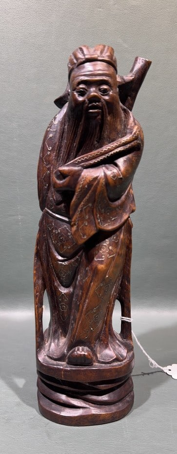 CHINESE HAND CARVED HARDWOOD DEITY FIGURE: WITH METAL INLAYS - 11" X 3.5"