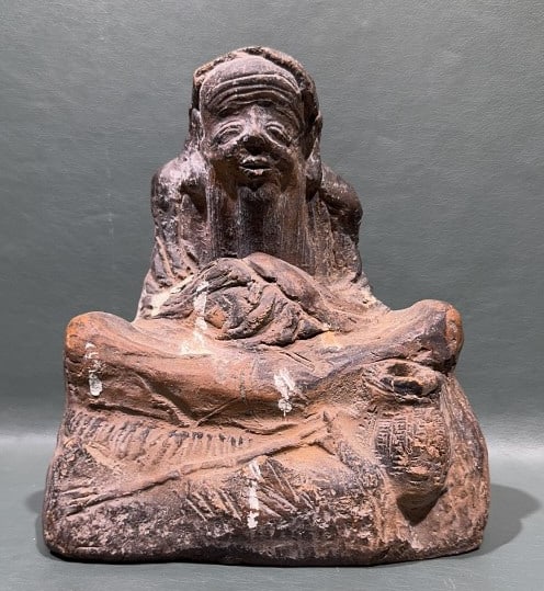 TERRACOTTA OR CLAY SCULPTURE OF SEATED BUDDHA: 8" X 7"