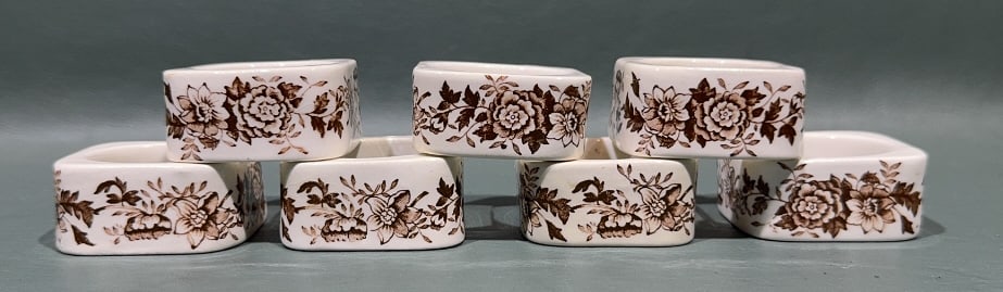 SET OF 7 ROYAL STAFFORDSHIRE NAPKIN RINGS: 2" X 2"