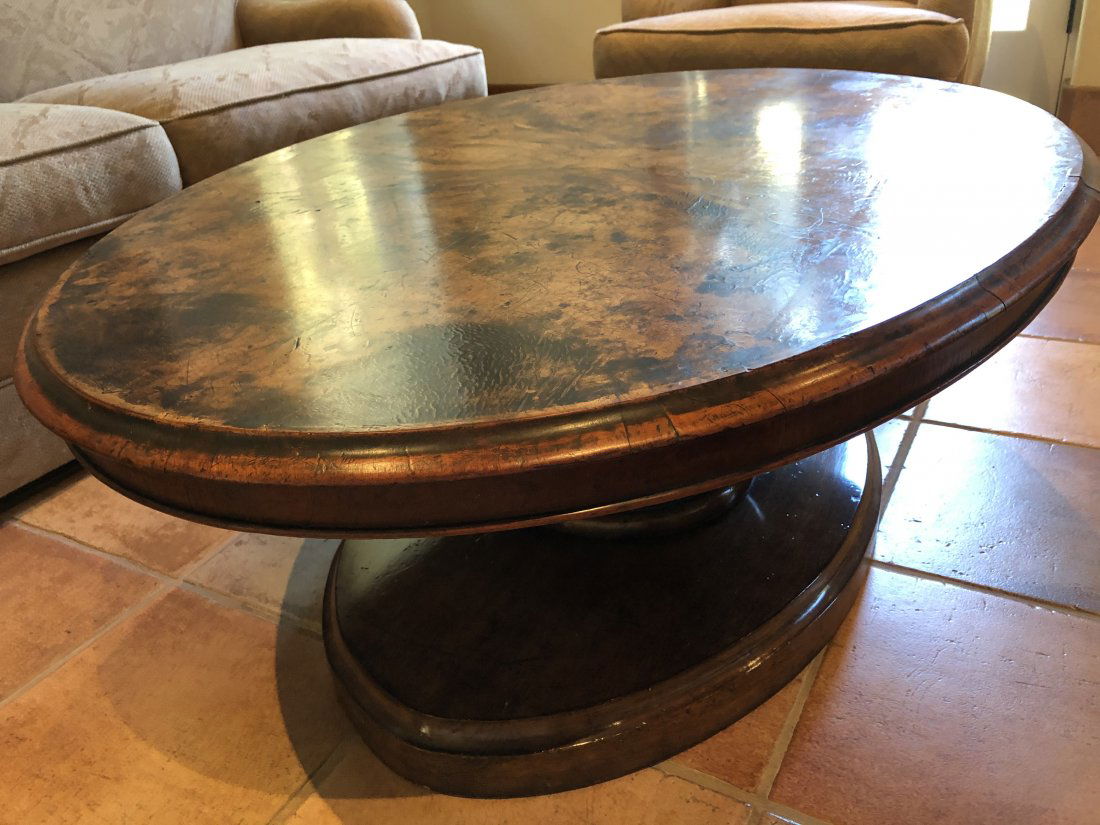 Oval Wood Coffee Table: Oval, pedestal base wooden coffee table, French provincial style fruitwood panels. Size 48 x 34.5 x 17.5. Buyer responsible for shipping or local pickup 93108.