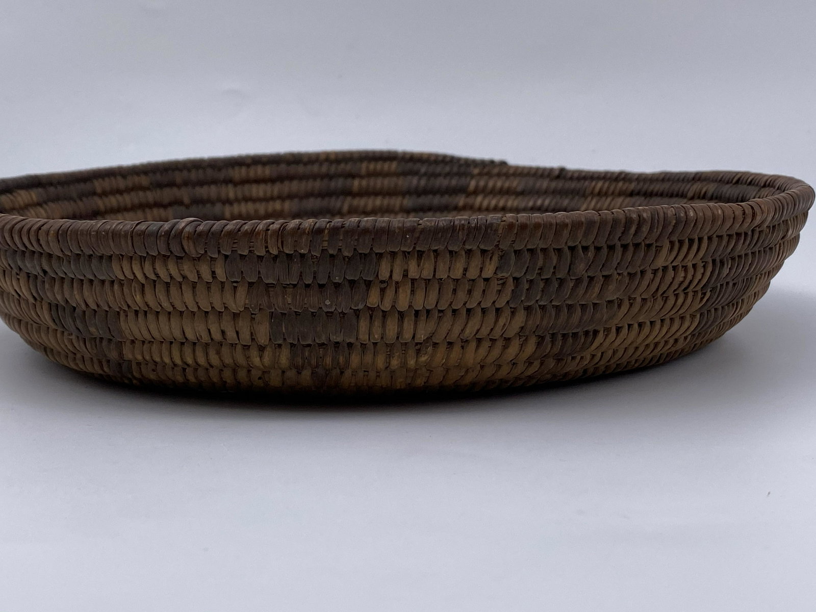 Paiute Tribe Woven Basket: Paiute Tribe twined coiled basket. Provenance- collection of Mrs D.Duffy, Santa Barbara, CA