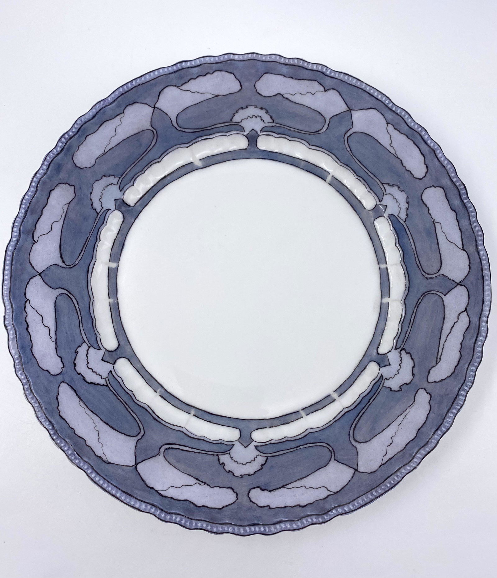 Ruffle Plate With Lilly Motif: Ruffle Plate With Lilly Motif. Neta Blanche Lazzell, Made in the Porcelain Factory Victoria Altrohlau, Austria (1904-18) Provenance- collection of Mrs D. Duffy, Santa Barbara, CA.