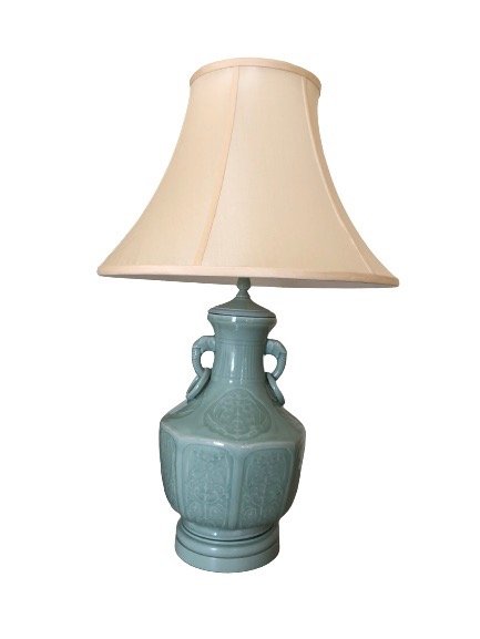 Chinoiserie Celadon Lamps- Pair: Chinoiserie Celadon Lamps. Made in the Early 20th Century. Elegant bottle vases with elephant head and rings handle. One lamp is in very good condition, the other has a repaired circumference crack.