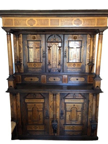 German inlaid cupboard of architectural form in the Renaissance style: A German inlaid cupboard of architectural form in the Renaissance style.Nineteenth century date reflecting a sixteenth/seventeenth design, comprising numerous woods including oak, burl walnut, satinwo