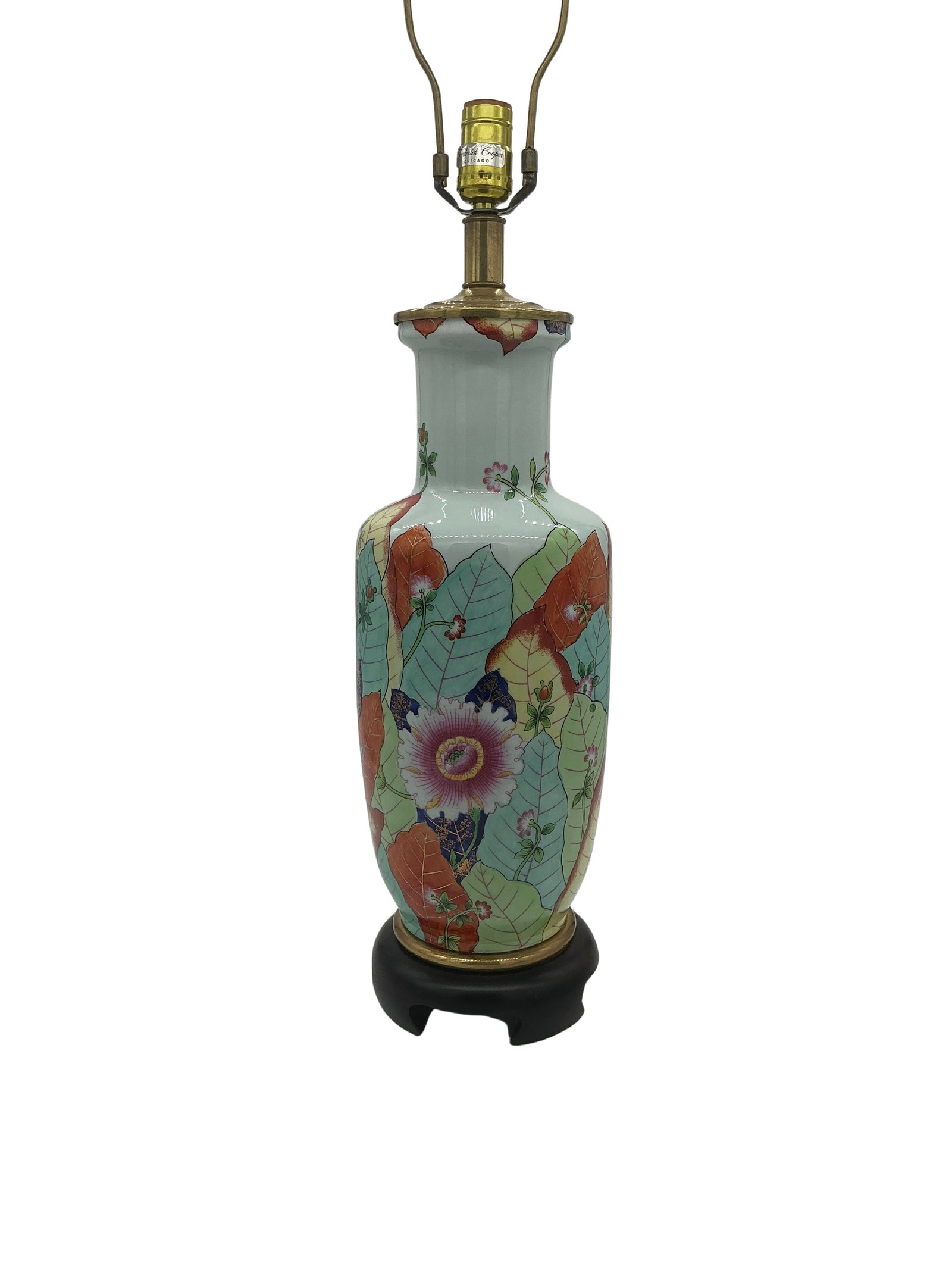 Frederick Cooper Tobacco Leaf Chinoiserie Lamp: This Tobacco Leaf Chinoiserie Lamp beautifully exemplifies traditional Chinoiserie design with a vibrant and intricate pattern. The body of the lamp features a porcelain construction, adorned with han