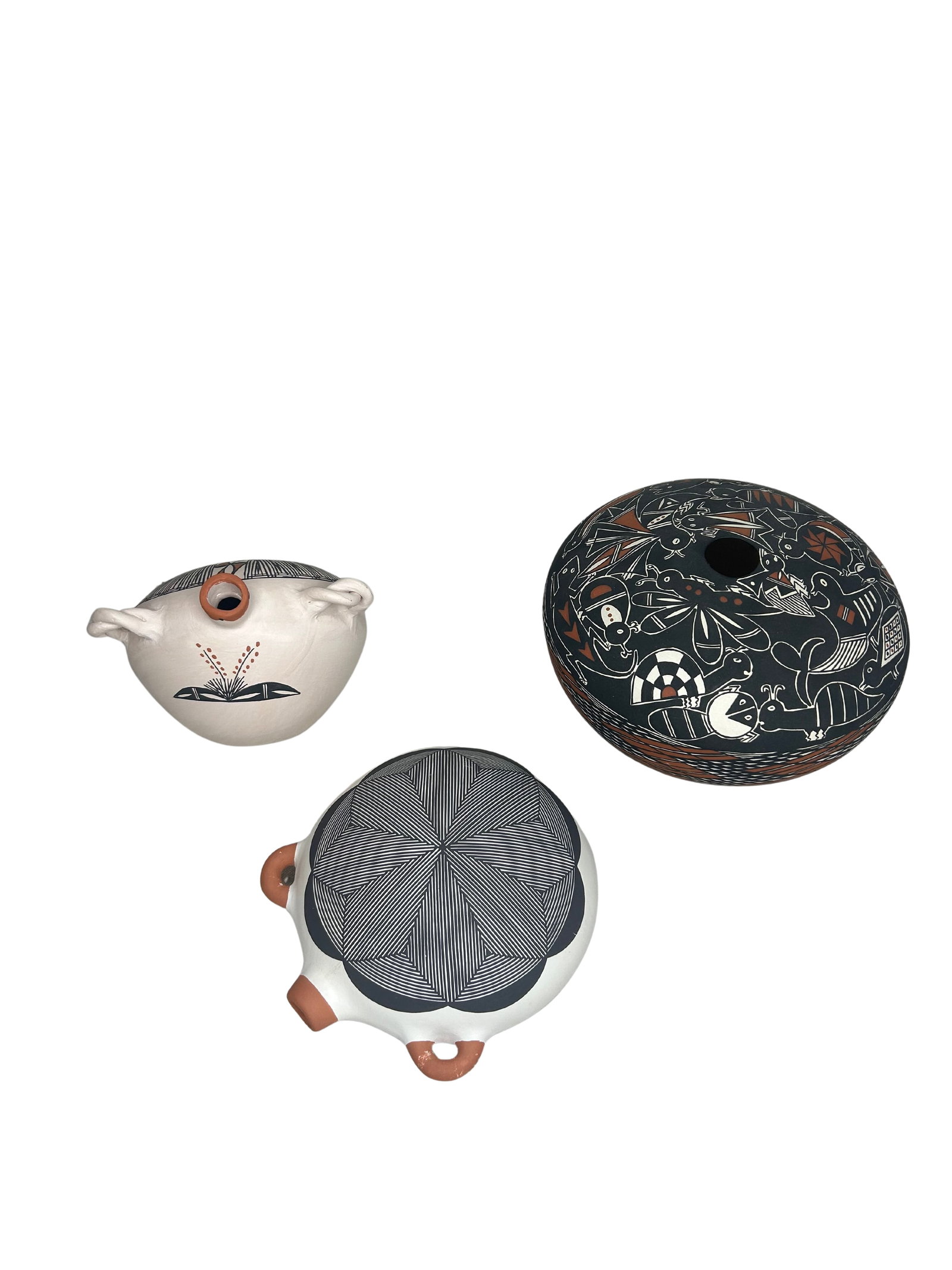 Acoma Pueblo Pottery Lot - Hand-Painted, Set of 3: This Acoma pottery lot consists of three vibrant traditional Acoma pieces, showcasing distinct designs and craftsmanship. The pieces feature intricate geometric patterns and traditional motifs,