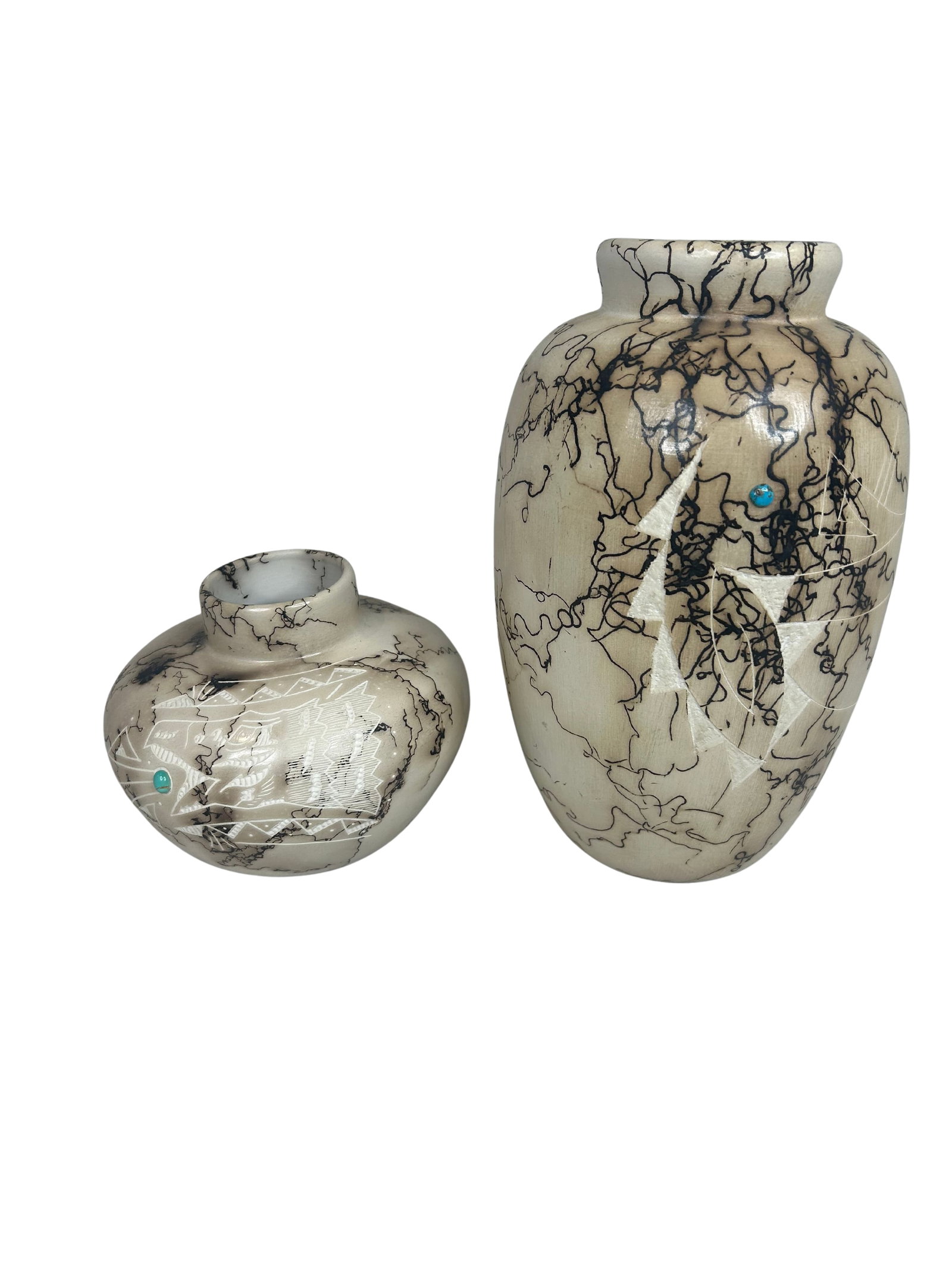 Authentic Navajo Pottery Set with Turquoise Accents: This Navajo pottery lot consists of two beautifully crafted pieces, showcasing traditional Native American artistry. The pottery features a striking black and white marbled design, which is