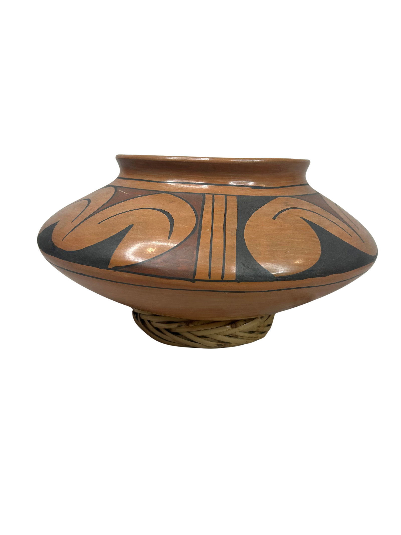 Pot made in Mexico: This is a charming Mexican ceramic pot featuring a traditional geometric design, indicative of a bold aesthetic that is both culturally rich and artistically appealing. Measuring 12 inches in width