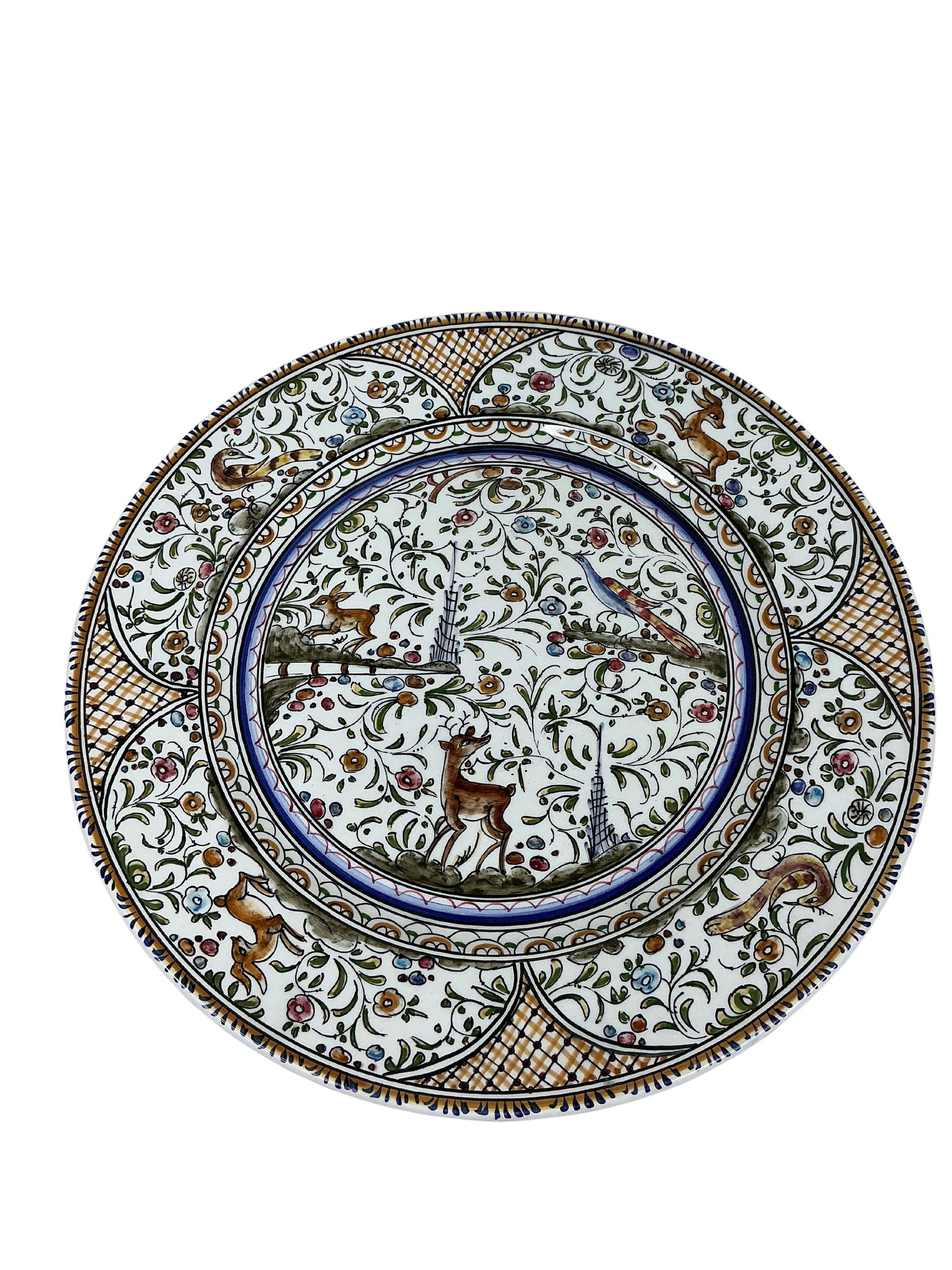 Vintage Hand-Painted Portuguese Animal Motif Platter: This is a beautifully crafted platter featuring an intricate animal motif, made in Portugal. The platter exhibits a rich hand-painted design with vibrant illustrations of deer, birds, and floral