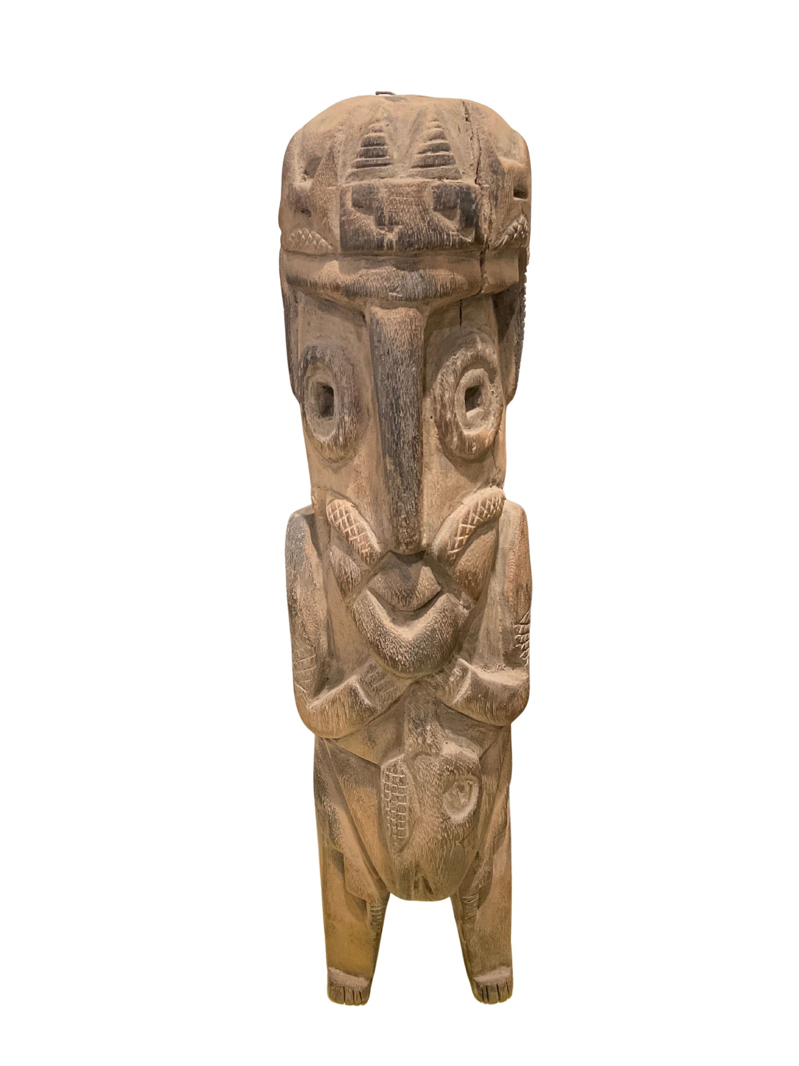 Handcrafted Wooden African Tribal Statue: This wooden African statue is a striking piece of decor with a primitive yet deeply expressive aesthetic. The statue is carved from a single piece of wood, showcasing intricate tribal patterns and