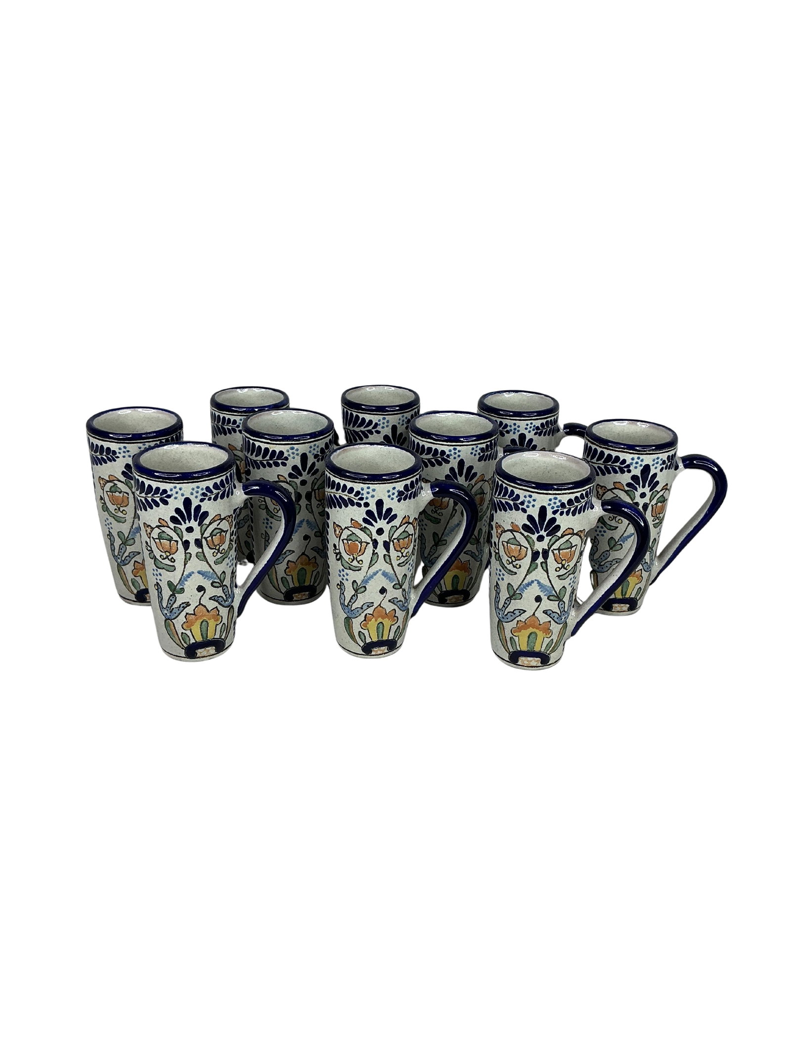 Set of 10 Hand-Painted Mexican Talavera Pottery Latte Mugs – Blue Floral Design: This set of 10 hand-painted Mexican Talavera pottery mugs features an intricate blue floral design, emblematic of traditional Mexican craftsmanship. Each mug measures 4 inches in width and depth and