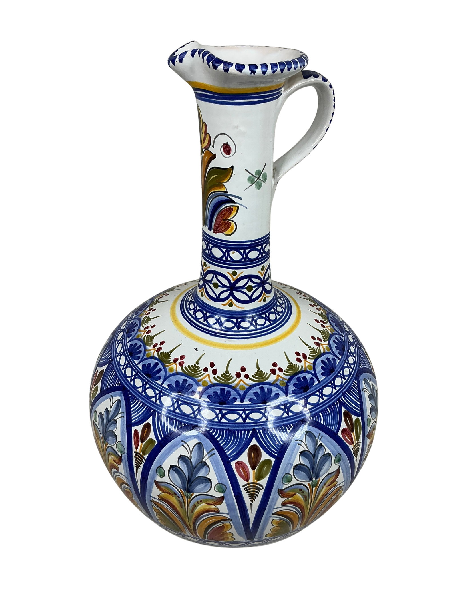 Vintage 1981 Hand-Painted Spanish Pottery Pitcher: This exquisite hand-painted pottery pitcher originates from Spain and dates back to 1981, as indicated by the inscription on its base. It stands out due to its elaborate and colorful design,