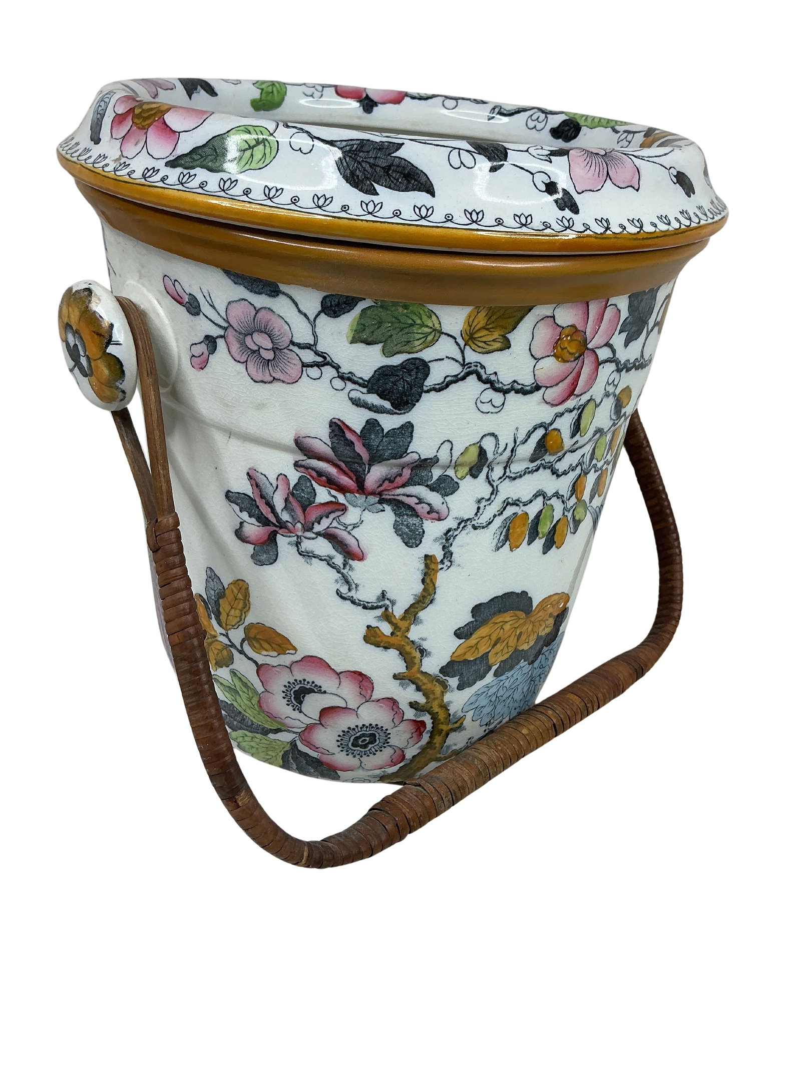Vintage Floral Bird Ceramic Hanging Planter Cachepot Wicker Handle Asian Motif: This vintage floral bird ceramic hanging planter cachepot is a charming decorative piece that embodies Asian motifs. The planter is designed with an intricate floral and bird pattern, showcasing