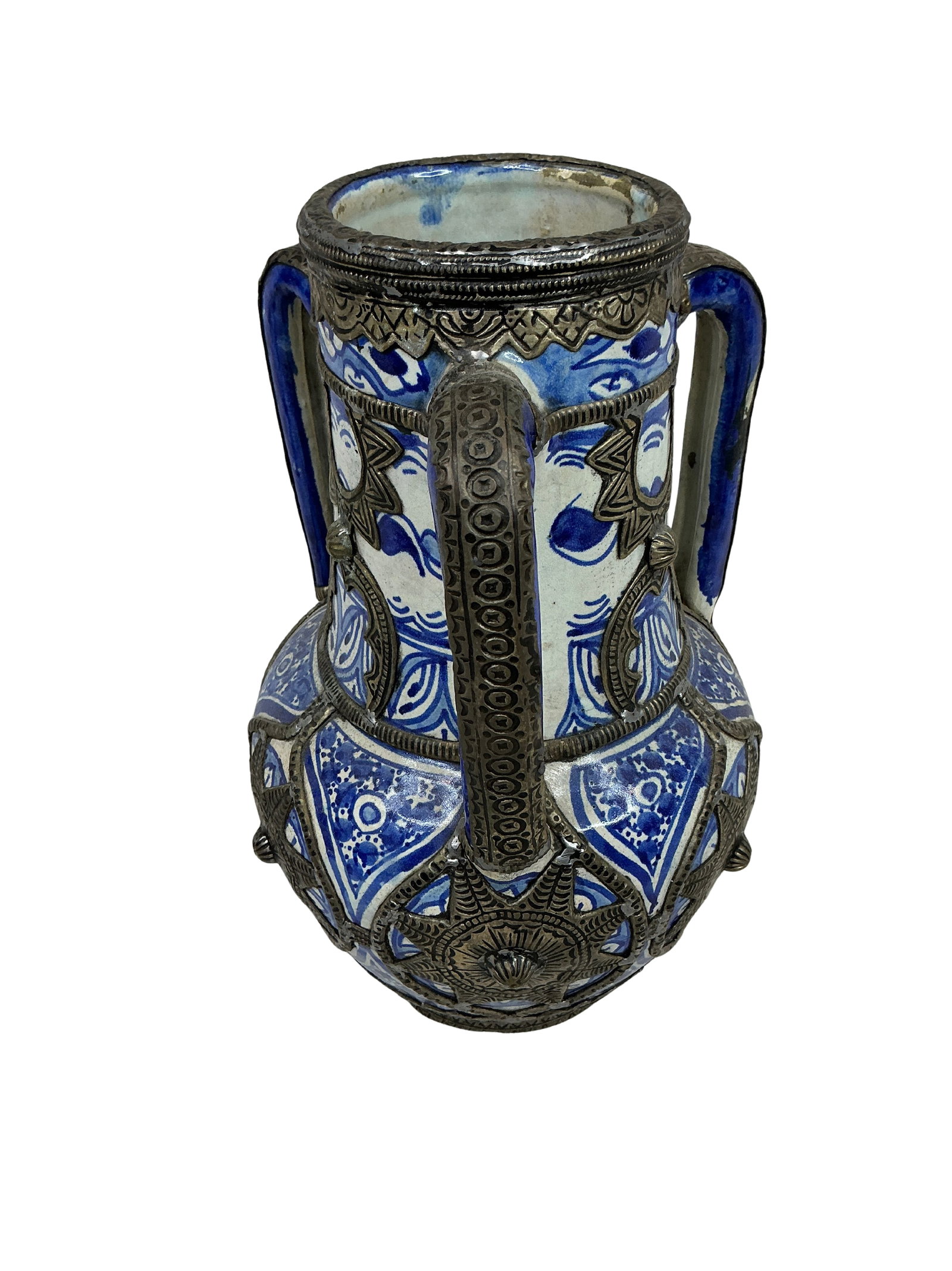 Moroccan Ceramic Vase with Intricate Metalwork Detailing: This is a stunning Moroccan vase, exquisitely crafted from ceramic and embellished with intricate metal detailing. The piece displays a vibrant blue and white palette that evokes traditional Moroccan