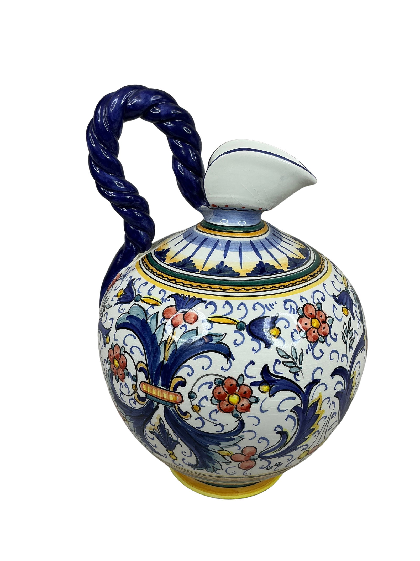 Hand-Painted Spanish Ceramic Pitcher with Twisted Handle: This extra wide Spanish ceramic pitcher, measuring 18 inches in height and 11 inches in diameter, is a vibrant and colorful example of traditional Spanish craftsmanship. The pitcher features a bold,