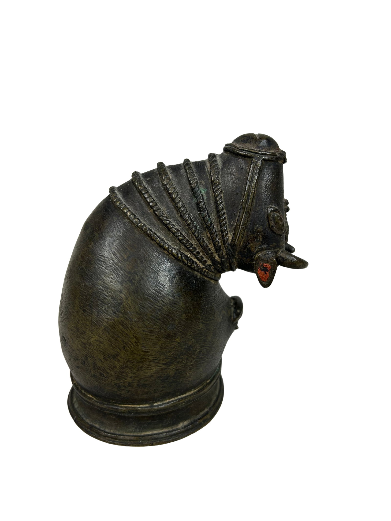 Bronze Nandi Bull Palanquin Pole End: This is a small, intricately designed bronze statue measuring 4.75 inches in height. The statue features a stylized figure with distinct facial features and ornate engraving that suggest cultural sign