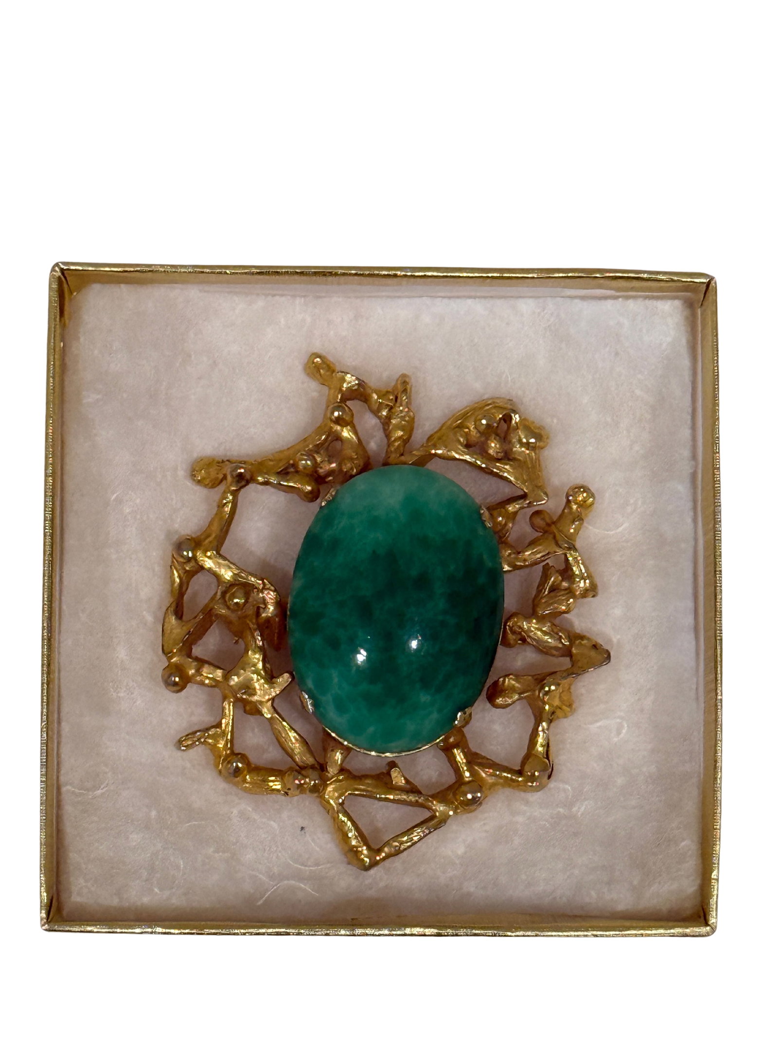 Vintage Jade and Gold-Plated Brooch: This striking brooch features a central jade stone set in an ornate, gold-plated metal frame, showcasing a whimsical organic design. Measuring 3.5 inches in width and 2.75 inches in depth, the brooch 