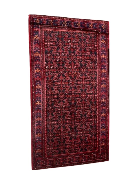 Traditional Persian Heriz Rug - Hand-Knotted Wool, 77" x 120": This Persian rug exemplifies the Heriz style, known for its bold and geometric floral designs. The intricate pattern features a central medallion with sharp angles and stylized motifs. The predominant