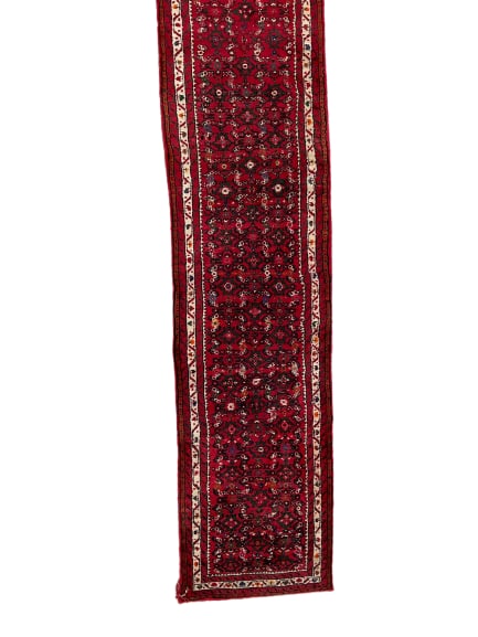 Handmade Vintage Persian Tribal Geometric Wool Rug: This exquisite handmade Persian tribal rug is a stunning example of traditional craftsmanship. Featuring vibrant red, green, and off-white hues, the rug showcases an intricate geometric pattern with d
