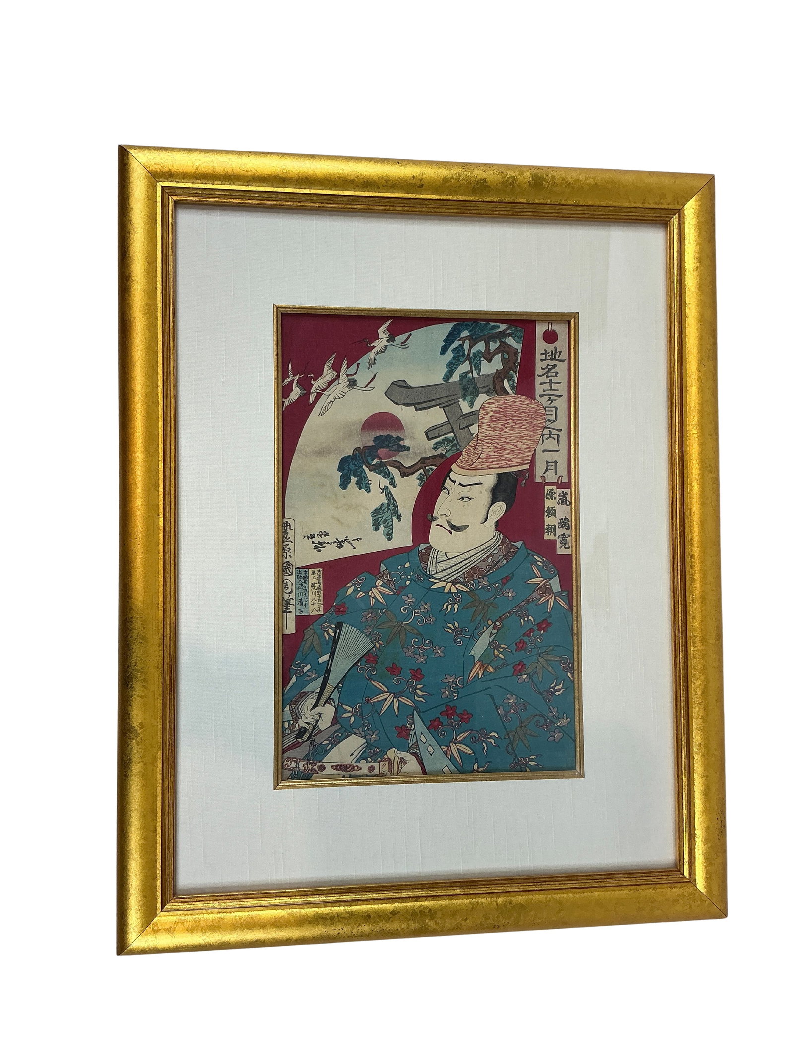 Japanese Woodblock Print Man with Hat with Gold Frame: This exquisite Japanese woodblock print, elegantly framed in a gold-colored frame, measures 8.5 inches by 13 inches. The artwork features a distinguished figure in traditional attire with intricate fl