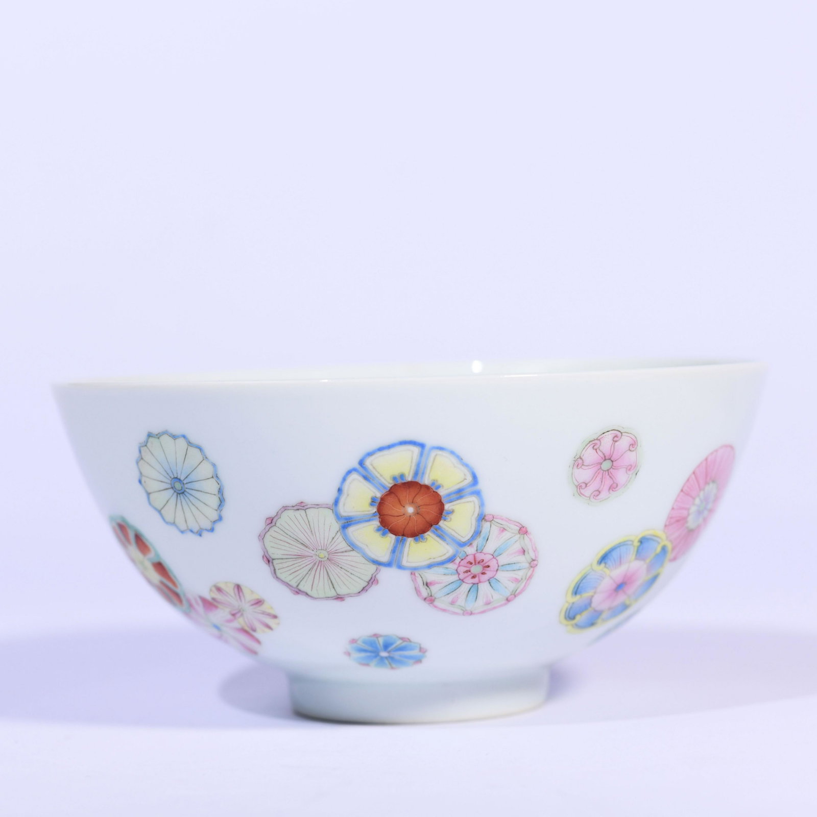 A Famille Rose Floral Porcelain Bowl: A Famille Rose Floral Porcelain Bowl Width:14.5cm, Height:7cm Good Conditions.Please bid with responsibility. All Lot items sold as is.