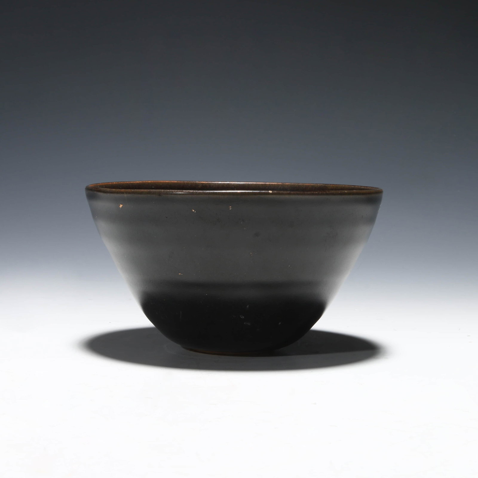 A Black-Glazed Jian Ware: A Black-Glazed Jian Ware Height:7cm, Diam.12cm Good Conditions.Please bid with responsibility. All Lot items sold as is.