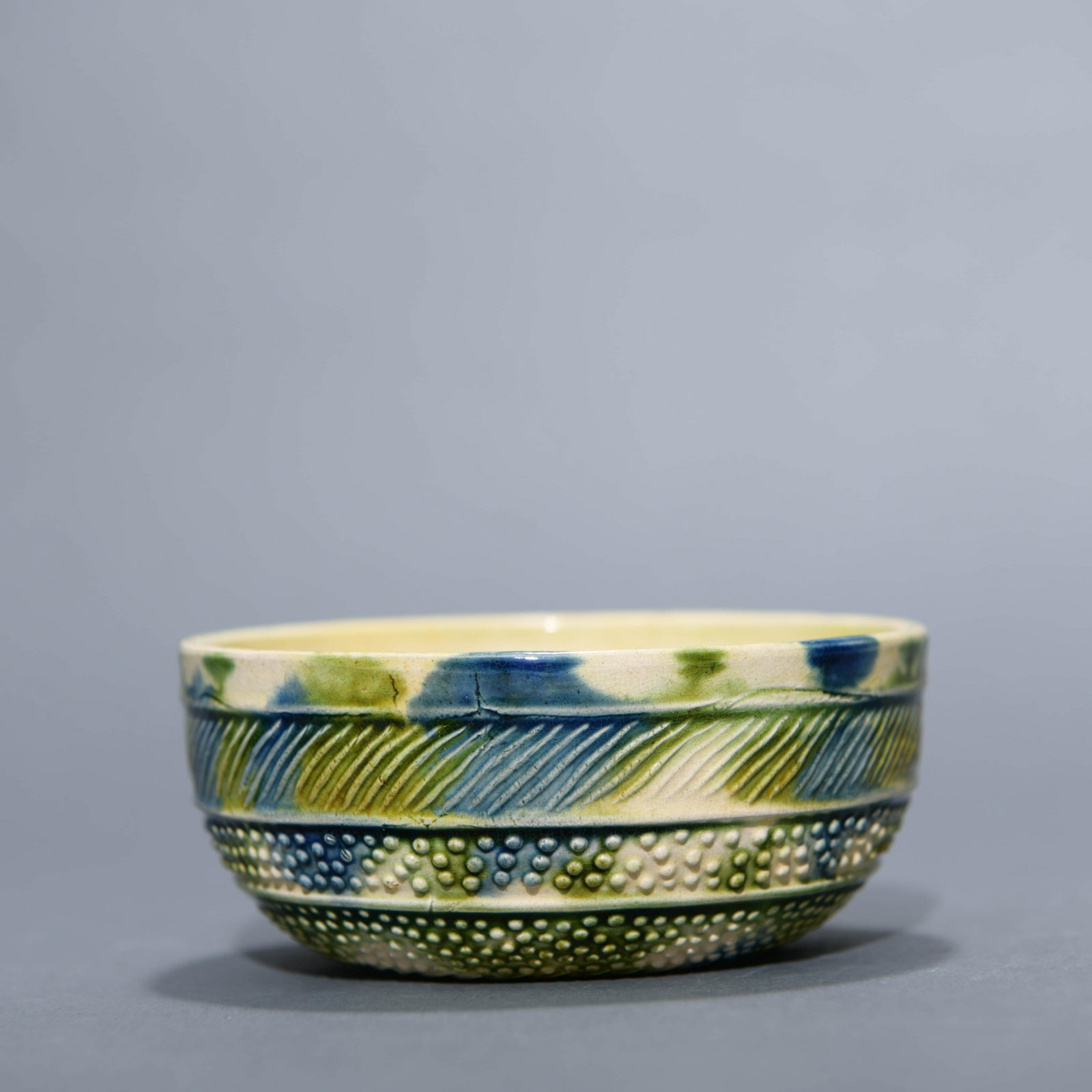 Sancai Glaze Pottery Cup: Sancai Glaze Pottery Cup Width:11cm, Height:4.5cm,