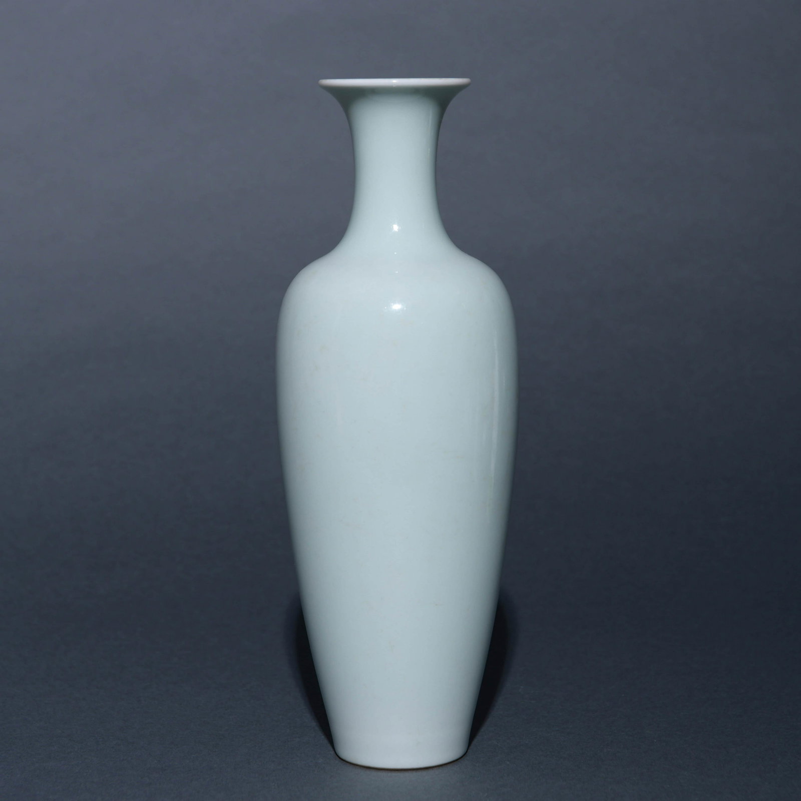 White Glaze Guanyin-Form Vase: White Glaze Guanyin-Form Vase Diam.8.3cm, Height:25.2cm,