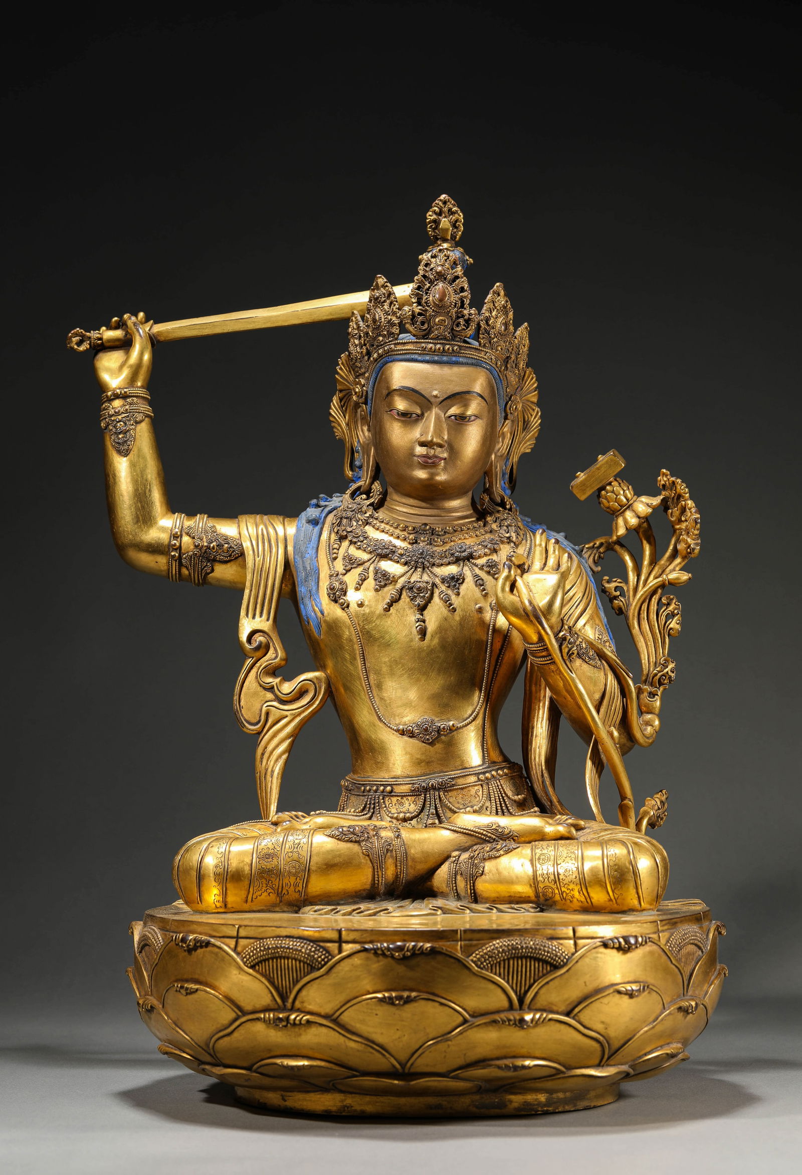A MONGOLIAN GILT BRONZE FIGURE OF MANJUSHRI (1 of 7)