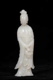 A HETIAN WHITE JADE 'MAGU OFFERING LONGEVITY' ORNAMENT
